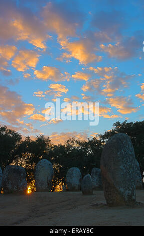 Cromlech of the Almendres at sunset is an important megalithic complex. Stock Photo