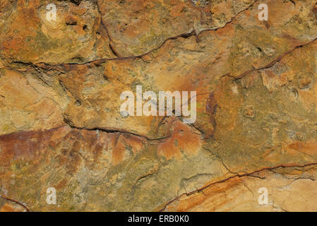 Rough, weathered sandstone surface as abstract background texture Stock Photo