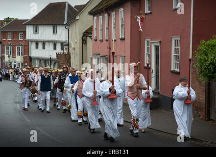 Thaxted, Essex, UK. 31st May, 2015. The Thaxted Morris Weekend, Thaxted and surrounding villages, Thaxted, Essex, England. 31 May 2015 Seen here: Morris Dancers process from the 14th cent. ancient Guildhall in the centre of Thaxted to the Thaxted Church for morning service and offeratory dance. 21 teams or 'sides' of Morris Men including teams from Holland , Denmak and Australia danced through the villages such as Finchingfield in rural north Essex during the start of the 345th meeting of the member clubs of the Morris Ring and the 82nd meeting hosted by the Thaxted Morris Men. © BRIAN HARRIS/ Stock Photo