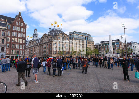 Amsterdam's Dam square with the National monument in the background, Dam square is located half a mile from Amsterdam central Stock Photo