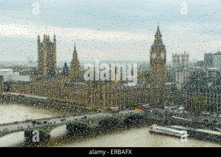 view to Big Ben, Westminster bridge and parliament through the wet window Stock Photo