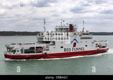 Red Funnel Ferry Red Falcon sailing down Southampton Water with Southampton Docks in the background Stock Photo