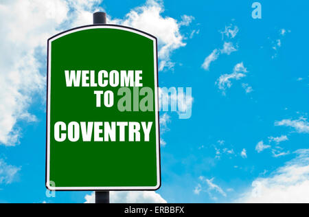 Green road sign with greeting message WELCOME TO COVENTRY, ENGLAND isolated over clear blue sky background Stock Photo