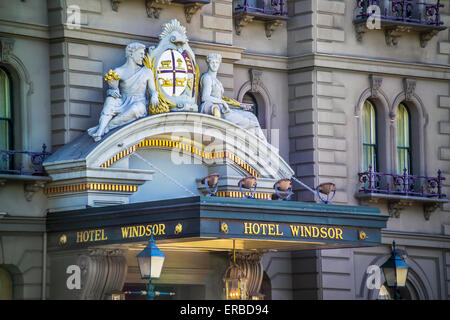 Grand marble statues and coat of arms on the front facade of Hotel Windsor, Spring Street, Melbourne Australia Stock Photo