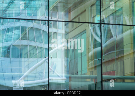 Building reflections on the facade of the East Mall of the Bull Ring Shopping Centre, Birmingham, UK Stock Photo