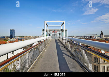 BRUSSELS, BELGIUM - MAY 27, 2015:  A man walk on  the panoramic lift Ascenseur des Marolles. It connects the Poelaert square wit Stock Photo