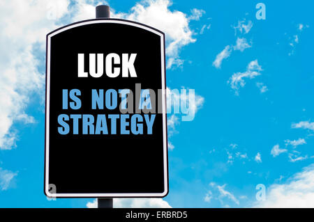 Not Strategy Sign STRATEGY written on road sign isolated over clear blue sky background ...