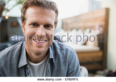 Close up portrait smiling man with stubble