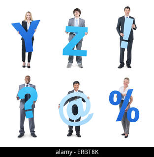 Group of business people holding the letter Stock Photo