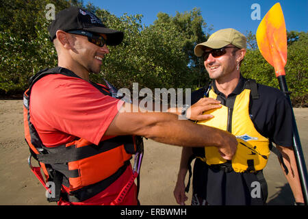 Seawater kayaking is a popular activity for visitors to far north Queensland, Australia. Stock Photo