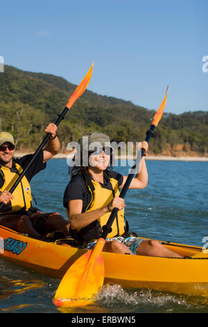 Seawater kayaking is a popular activity for visitors to far north Queensland, Australia. Stock Photo