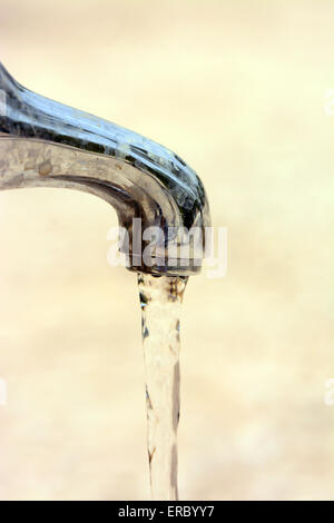 Running tap Stock Photo