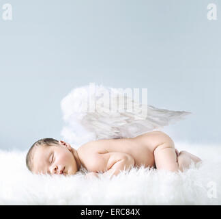 Newborn baby as an cute angel Stock Photo