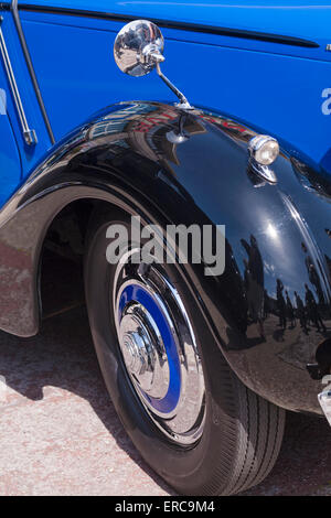 Reflections in shiny mudguard with wheel of Sunbeam Talbot car Stock Photo