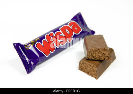 Wispa chocolate bar on white background with open cut up bar by the side Stock Photo