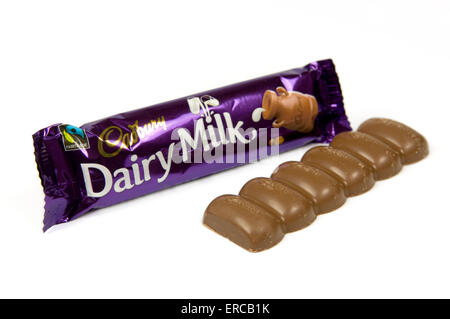 Dairy milk chocolate on white background with open bar by the side Stock Photo