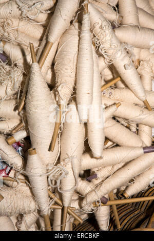 UK, England, Cheshire, Styal, Quarry Bank Mill, spindles of spun cotton Stock Photo
