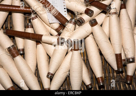 UK, England, Cheshire, Styal, Quarry Bank Mill, spindles of spun cotton Stock Photo