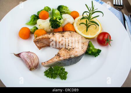 Grilled salmon steak and vegetables, top view Stock Photo