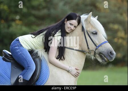 woman rides Icelandic horse Stock Photo