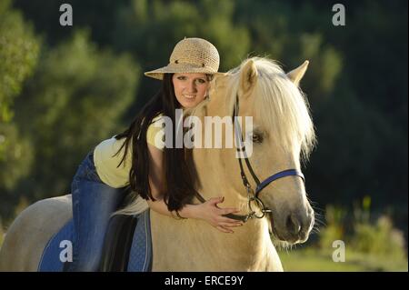 woman rides Icelandic horse Stock Photo