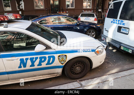 NYPD Police Car Parked Up In Times Square Tourists Pass By, New York ...