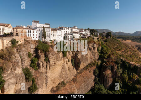 Whitewashed Houses atop El Tajo Gorge Canyon, Ronda, Andalusia, Spain Stock Photo