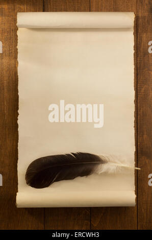 parchment scroll on wooden background Stock Photo