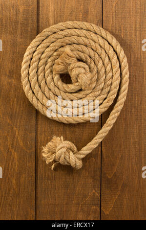 ship ropes on wooden background Stock Photo