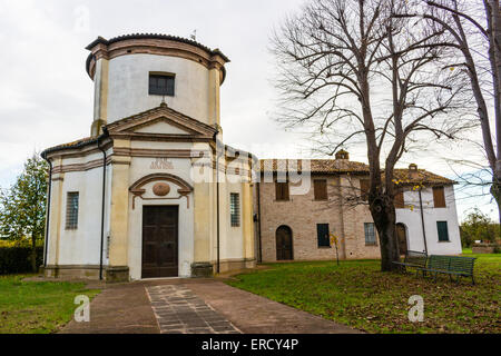 Facade of a XVIII century oratory, baroque church dedicated to an image of the Madonna from Loreto in the village of Passogatto near Ravenna in the countryside of Emilia Romagna in Northern Italy Stock Photo