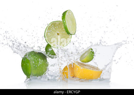 Limes and lemons with water splash isolated on white Stock Photo