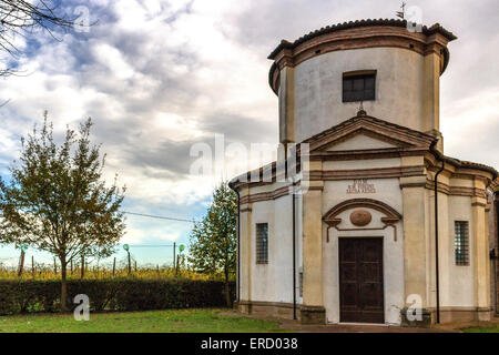 Facade of a XVIII century oratory, baroque church dedicated to an image of the Madonna from Loreto in the village of Passogatto near Ravenna in the countryside of Emilia Romagna in Northern Italy Stock Photo