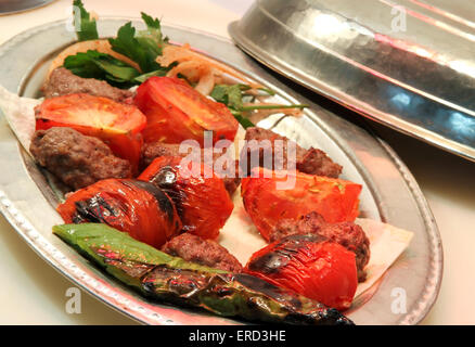 Turkish Kebab served in an anatolian plate. Stock Photo