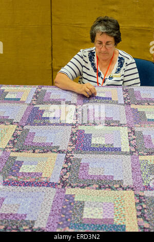 Eunice, Louisiana - A quilting demonstration at the National Park Service's Prairie Acadian Cultural Center. Stock Photo