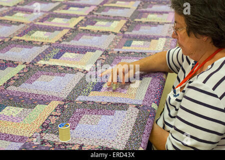 Eunice, Louisiana - A quilting demonstration at the National Park Service's Prairie Acadian Cultural Center. Stock Photo