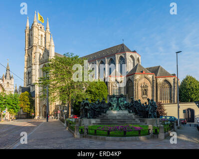 Statue of the Van Eyck brothers behind the St. Bavo's Cathedral (Sint Baafskathedraal), Ghent, Belgium Stock Photo