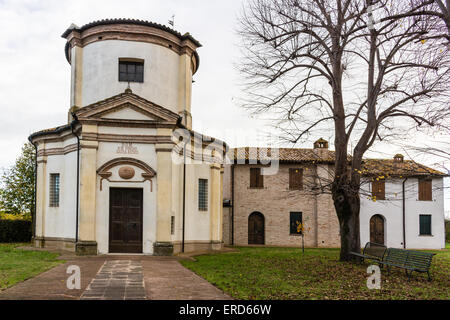 Facade of a XVIII century oratory, baroque church dedicated to an image of the Madonna from Loreto in the village of Passogatto near Ravenna in the countryside of Emilia Romagna in Northern Italy Stock Photo