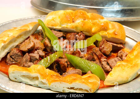 Turkish Kebab served in an anatolian plate. Stock Photo