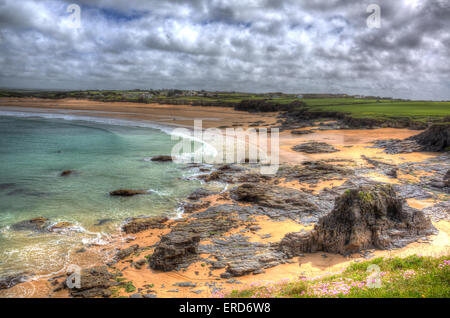 Grey cloudscape Harlyn Bay beach North Cornwall England UK near Padstow and Newquay HDR like a painting Stock Photo