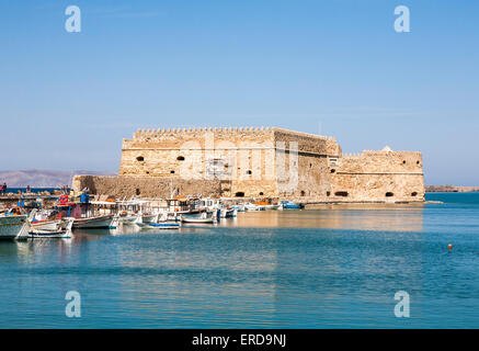 The Venetian fortress of Rocca al Mare (Koules Fortress) in Heraklion, Crete, in the Inner Harbour with blue sky on a sunny day Stock Photo