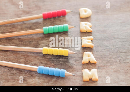 Dream alphabet biscuit on wooden table, stock photo Stock Photo