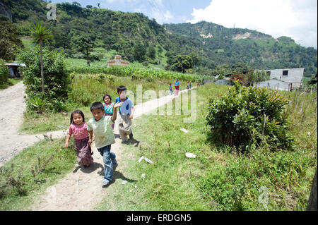 Guatemala indigenous children walk home from preschool in Tierra Linda, Solola, Guatemala. Stock Photo