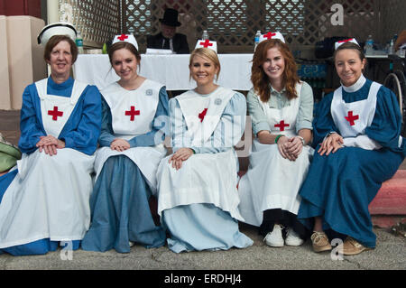 Nurses in period costumes at Dickens on The Strand parade, The Strand, Galveston, Texas, USA Stock Photo