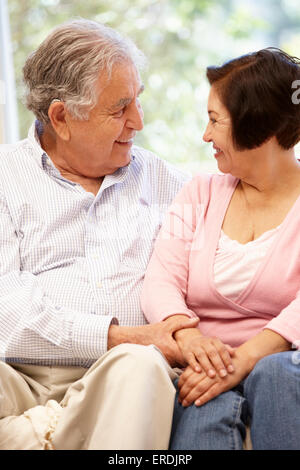 Senior Hispanic Couple Relaxing At Home Stock Photo - Alamy