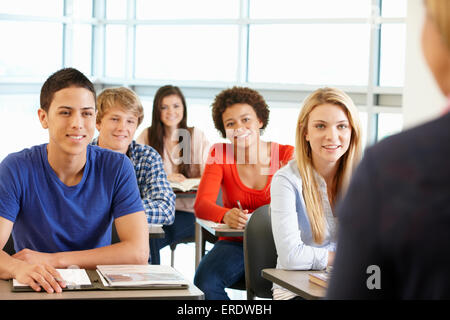 Multi racial teenage pupils in class Stock Photo