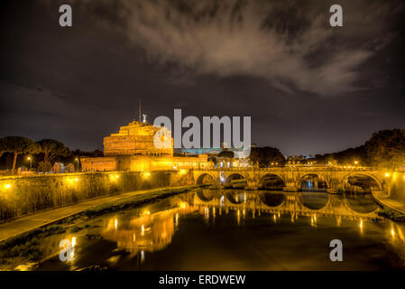 Mausoleum of Hadrian or Castel Sant'Angelo and Ponte Sant'Angelo at night, Rome, Lazio, Italy Stock Photo