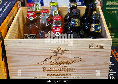 Cases of beer and bottles in a Cabardès wine case at a Majestic wine warehouse, Wanstead, London Stock Photo