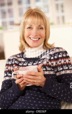 portrait of mature woman relaxing in blossoming garden Stock Photo - Alamy