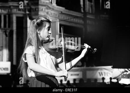 English violinist Nicola Loud (b. 1974), then aged 15, performing at the Schools Prom, Royal Albert Hall, London in 1983