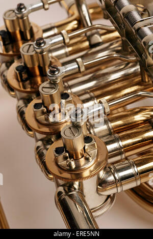 Wagner Tuba, valved brass instrument with conical bore. Detail of valves and tubing. Waldhorntuba. Ringtuba. Stock Photo